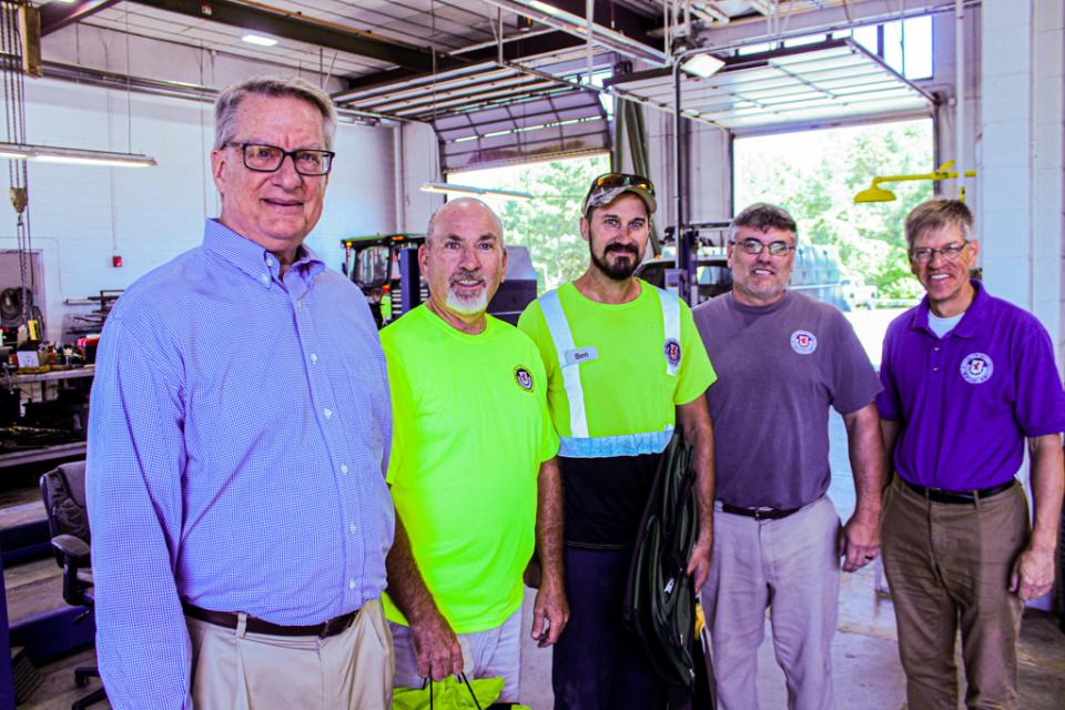 Roads and Facilities. From left: County Manager Clay Stamp, Rick Potter (10 yrs), Benjamin Cannon (5 yrs), Superintendent of Roads and County Facilities, Brian Moore, Council Vice President Pete Lesher
