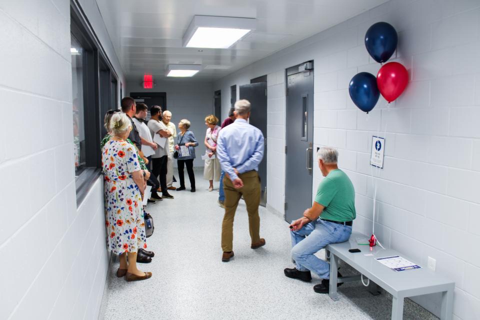 Visitors toured the holding cell area within the new Talbot County Sheriff's Office, getting a behind-the-scenes look at the secure facilities used to temporarily hold individuals in custody during law enforcement operations.