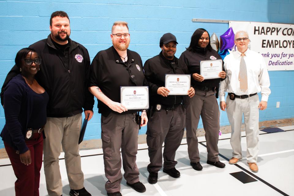 Several staff members were also recognized for recent promotions.