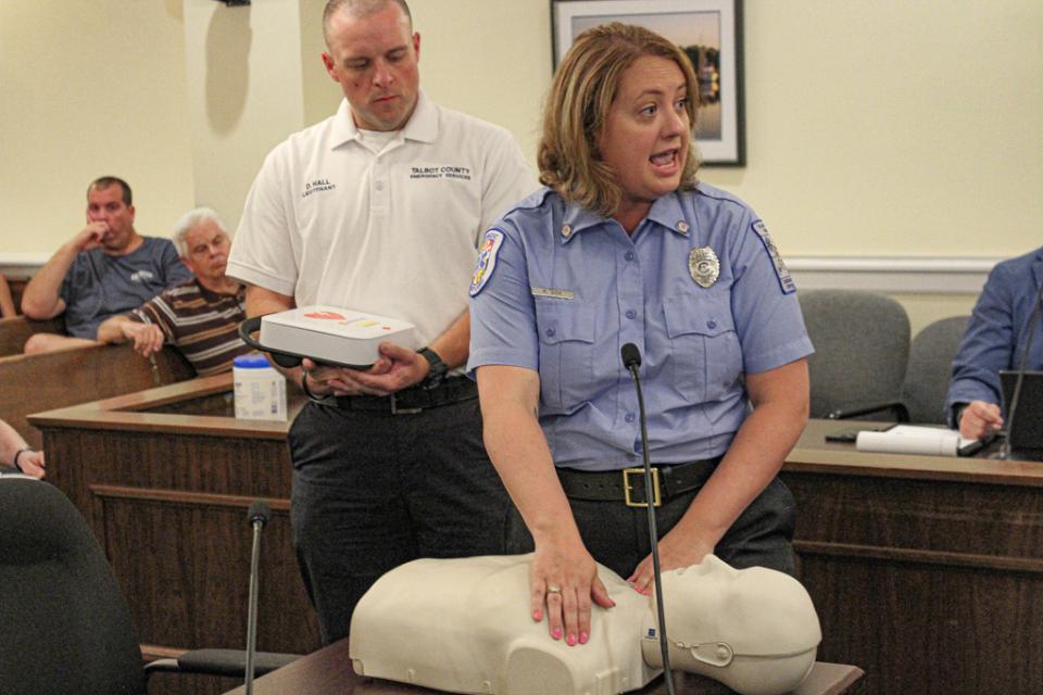 Rachael Cox, Special Programs Paramedic for the Department of Emergency Services, demonstrates proper CPR technique.