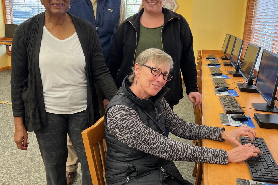 Pictured in the updated computer lab are seated Kathy Bosin of Dock Street Foundation. Standing left to right are Andy Hollis, Executive Director of Upper Shore Aging, Inc., Childlene Brooks, Manager of Brookletts Place, and Jennifer Marchi.