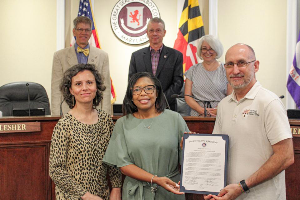 Council Member Keasha Haythe awards ChesMRC a Certificate of Recognition that honors the essential work of the nonprofit and celebrates their 10th anniversary.
