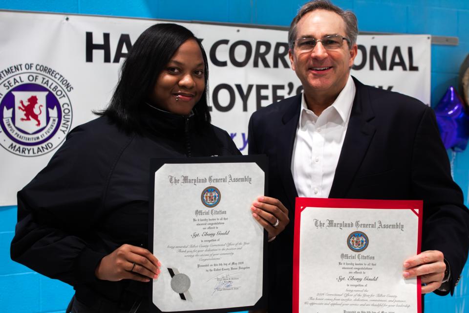 Senator Johnny Mautz (right) presented Sergeant Ebony Gould with House and Senate Citations.
