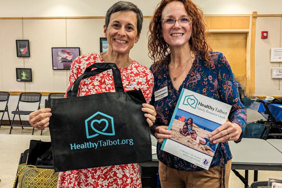 Nancy Andrew, Executive Director of Talbot Family Network (left), and Rachel Stoyanov, Healthy Talbot Coordinator, work together to make the Healthy Talbot Family Resource Guide available to the community.