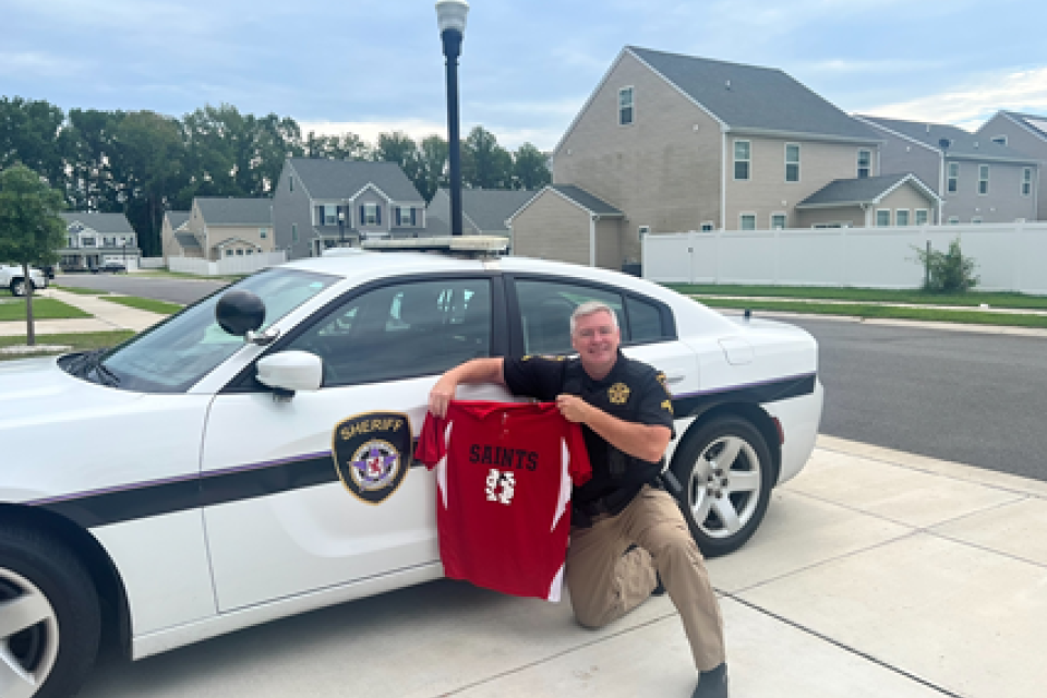 Corporal Tim Conners returns to St. Michaels Middle High School.